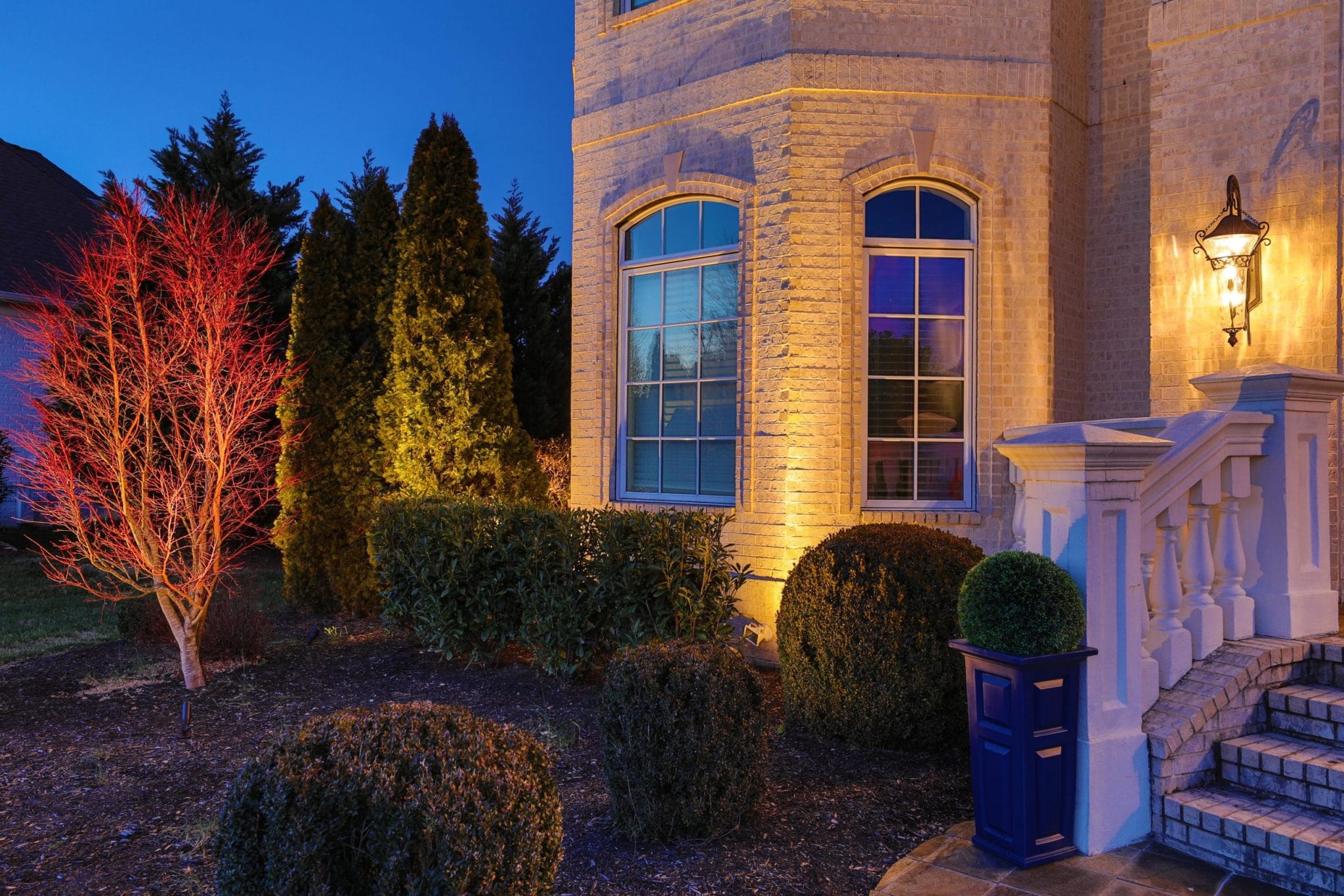 Landscape lighting that highlights new home
